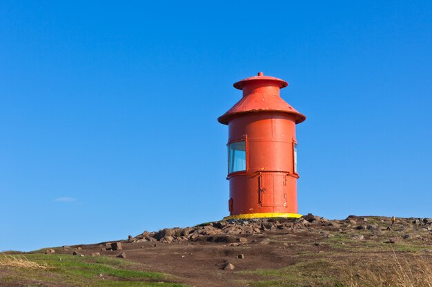 Red Lighthouse on a hill, Iceland