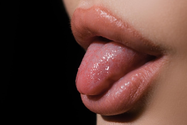 Red lips mouth and tongue icon Poster and banner of open mouth Closeup woman licking lips Female sexy mouth with tongue