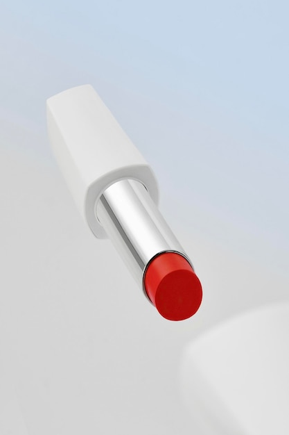 Red lipstick on light background Cosmetics Levitation