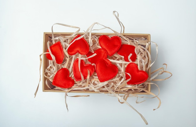 Red little hearts in a gift box View from above Celebrating Valentine's Day