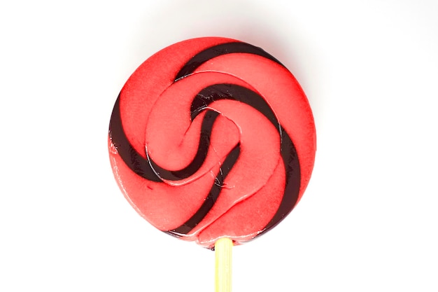 red lollipop isolated on white