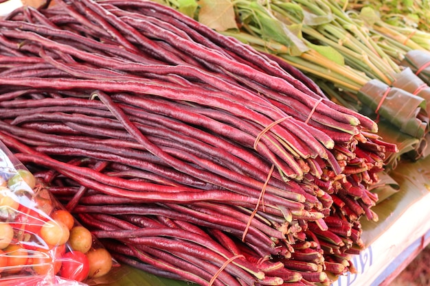 red long beans at market