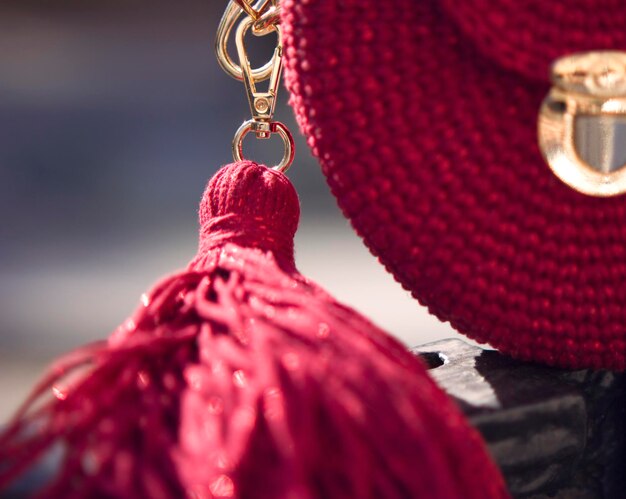 red luxury shining knitted bag with magic light close up