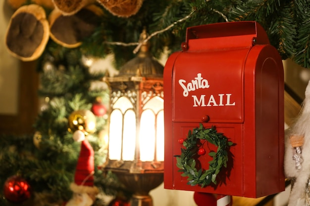 red mailbox for letters to santa claus on christmas background