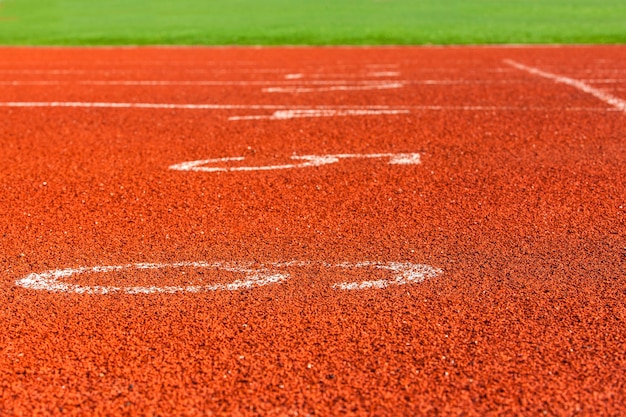 Red markings on the racetrack at the stadium.