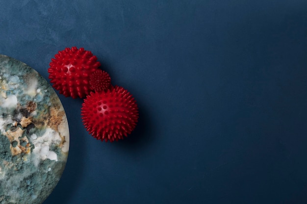 Red massage balls on a contrasting textured background