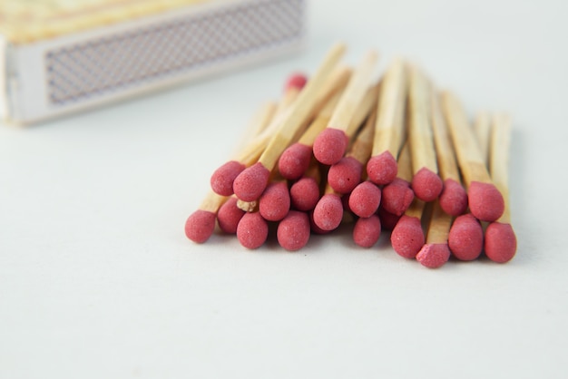 red matches on a white background