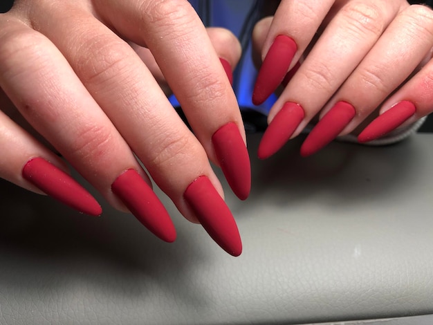 Red matte nails. Beautiful manicure.