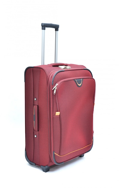 Red of modern large suitcase on a white