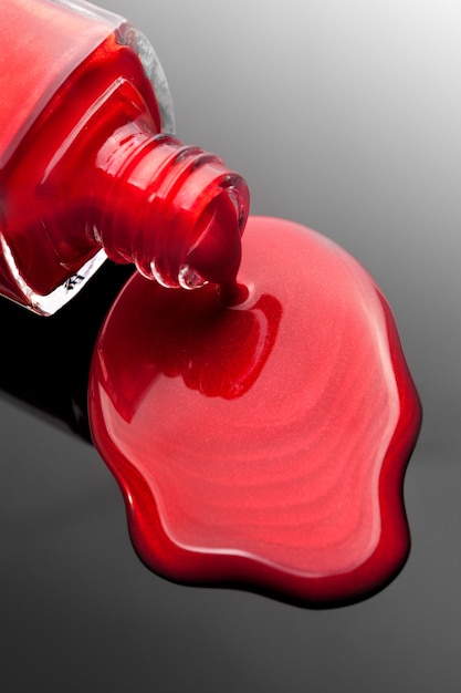 Red nail polish bottle