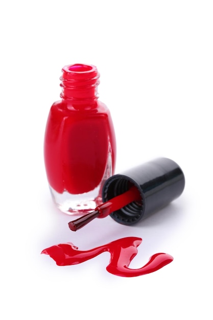 Photo red nail polish isolated on white