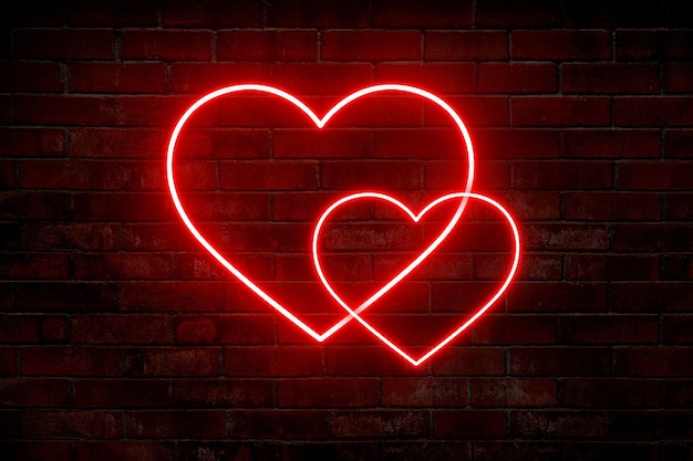 A red neon heart with two hearts on a brick wall