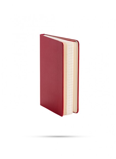 Photo red notebook on isolated white background