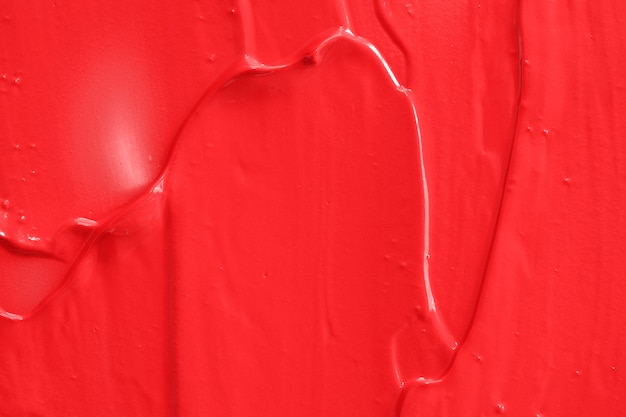 Red oil paint. background for designer