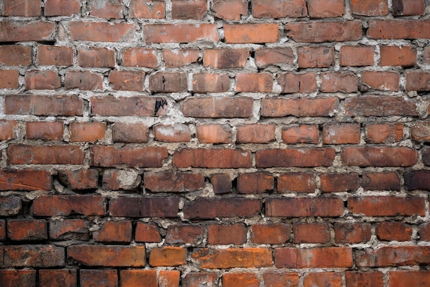 Red old brick wall background. Urban street texture. Grunge brown stonewall.