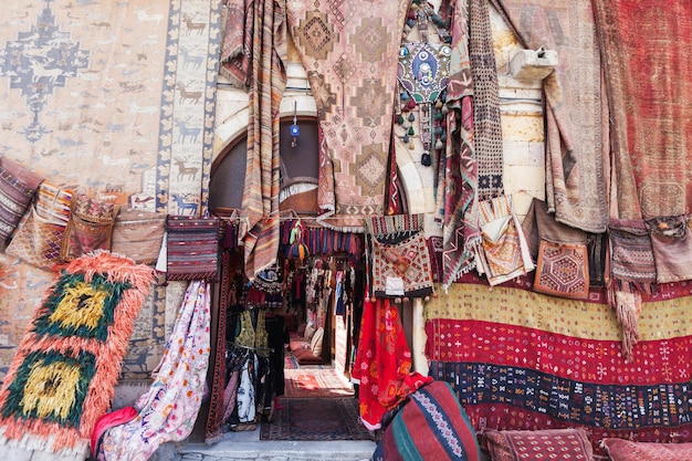 Red and old carpets in turkish bazaar