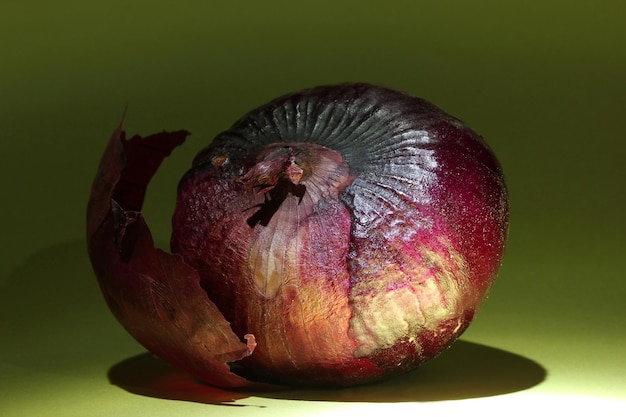 Red onion on colorful background