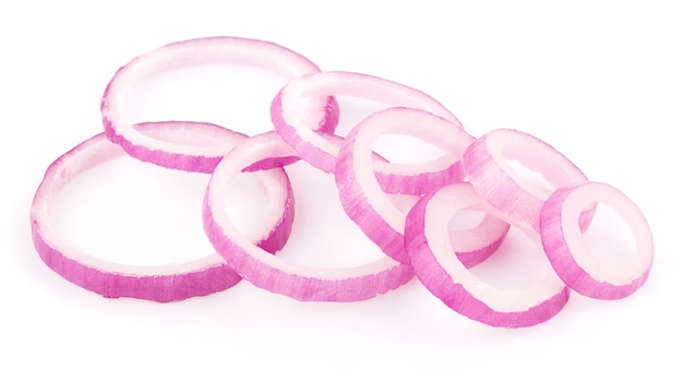 Red onion rings on white background