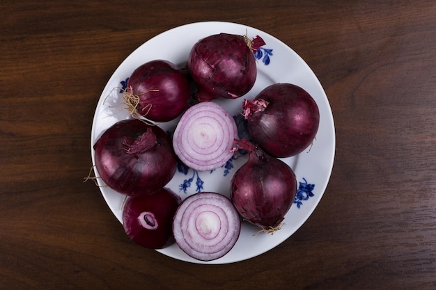 red onion on a white plate