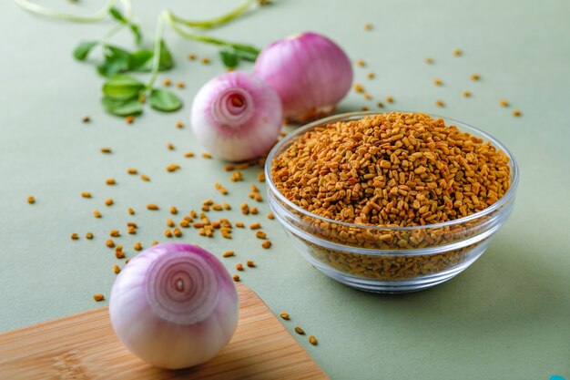 red onions and spices on table