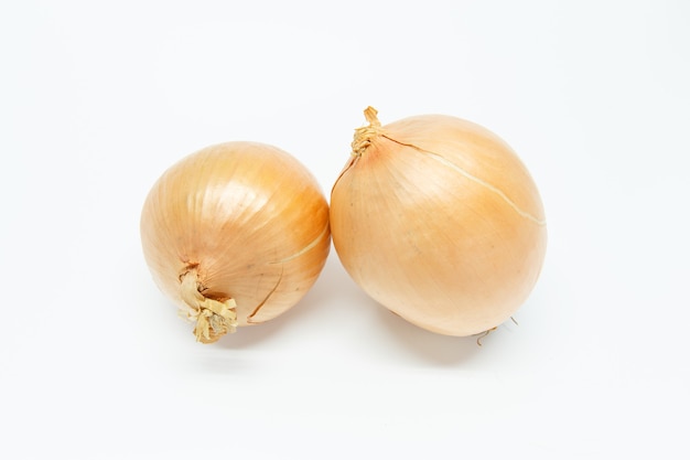 Red onions on white background