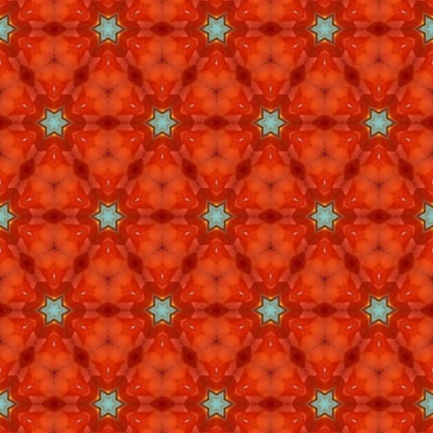 Photo a red and orange background with a pattern of stars