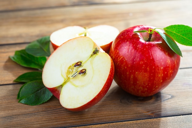 Red organic apples on table