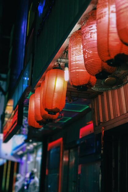 Red paper asian lanterns night street decoration by bright lanterns