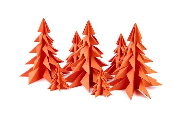 Red paper Christmas trees isolated on white