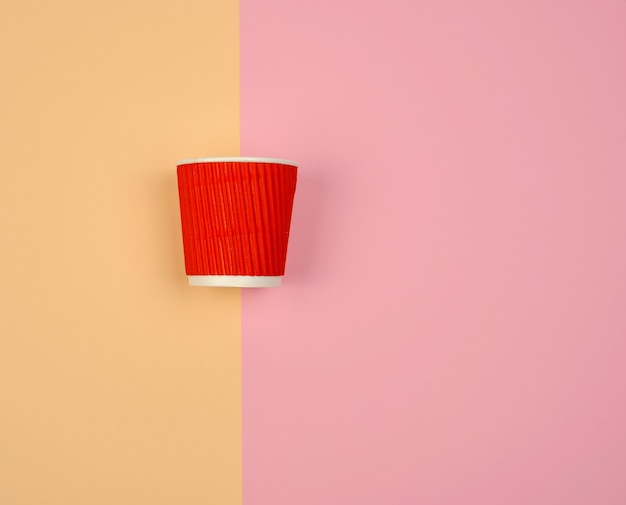 Red paper cup with corrugated edges for hot drinks 