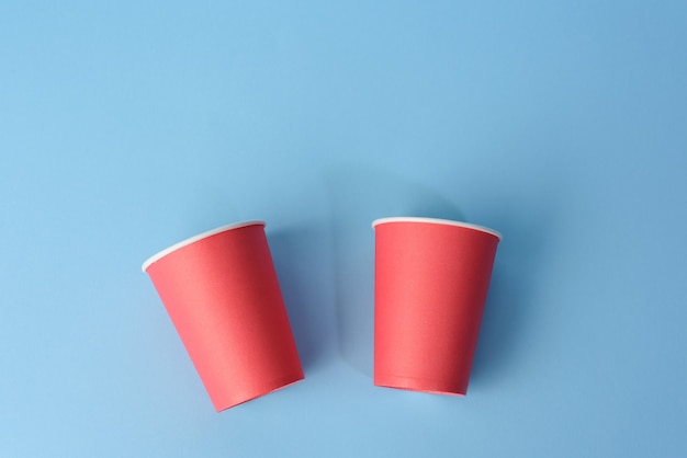 Row Of The Piles Of The Disposable Paper Cups In Red, Green, Blue And  Yellow Colors On A Light Background Stock Photo, Picture and Royalty Free  Image. Image 78537151.