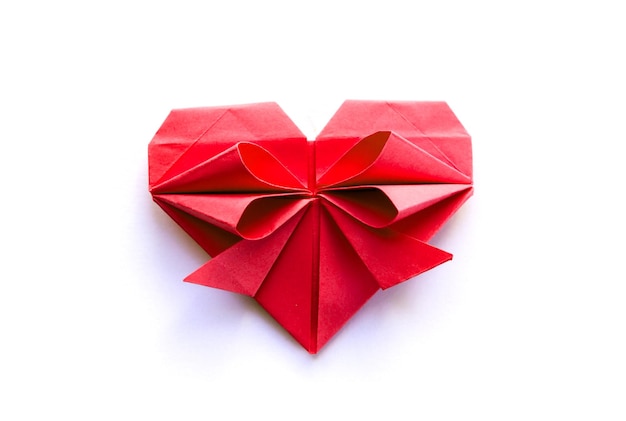 Red paper heart origami isolated on a white background