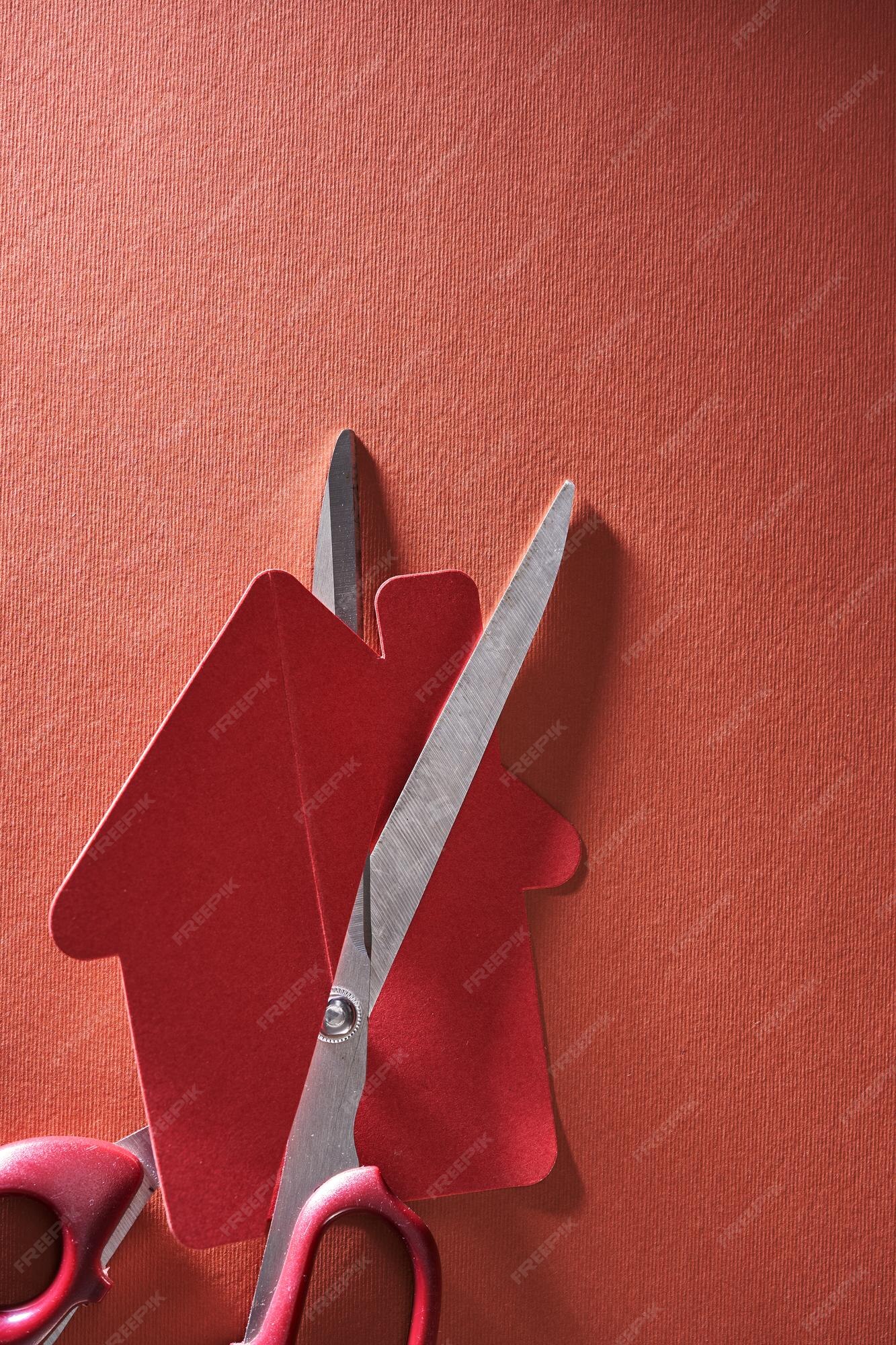 Premium Photo Red paper model house cut in half