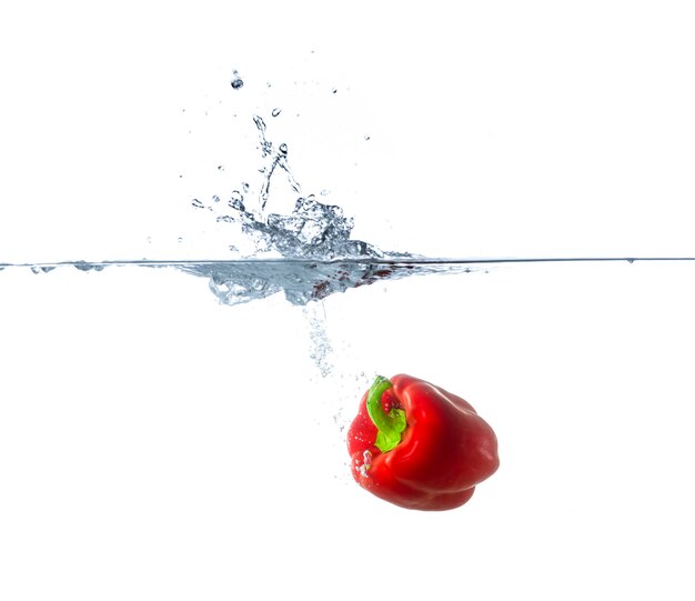 Red Paprika Sinking in Water