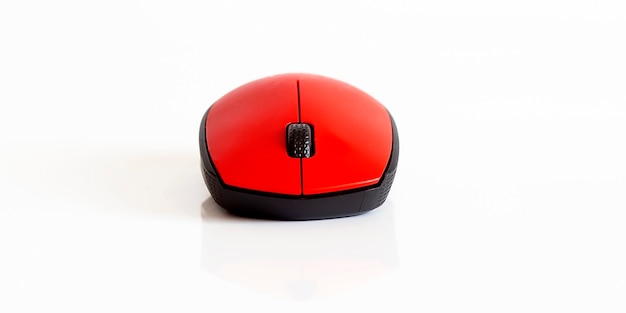 Red pc mouse isolated on the white wall