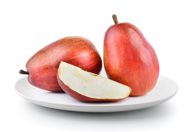 Red pears in a plate isolated on a white background