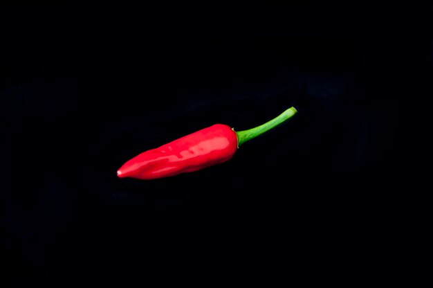 Red pepper black black background