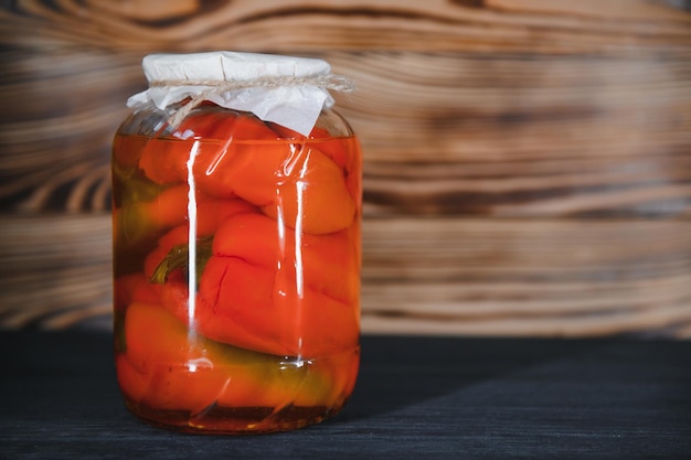 Red peppers pickled in glass jars