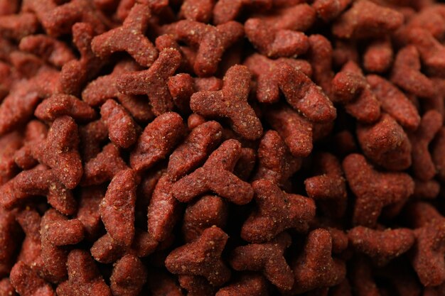 Red pet feed on whole, close up