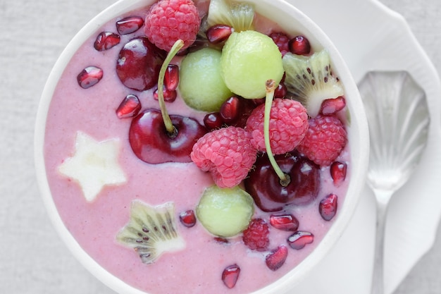 Red pink and green smoothie bowl, christmas fun food 