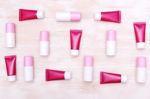 Red and pink tubes on the white background