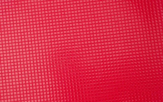 Red plastic texture, full frame, close up