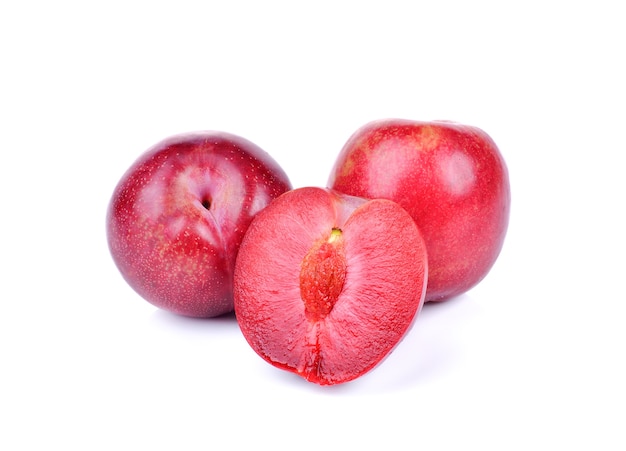 Red plum isolated on white