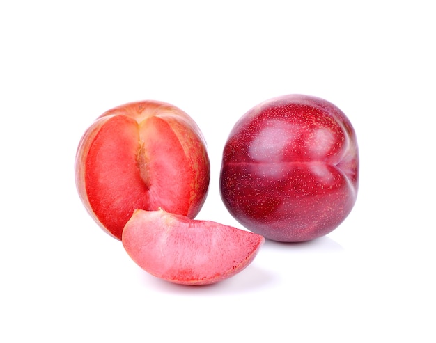 Red plum isolated on white