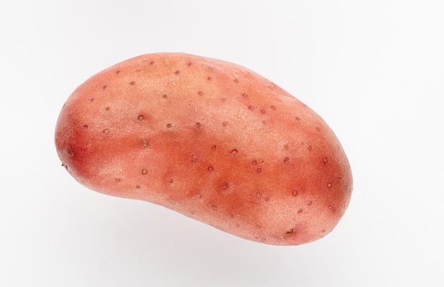 Red potato isolated on white background.