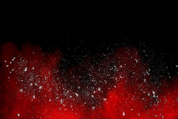 red powder explosion on black background