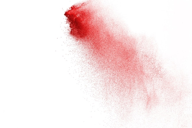 Red powder explosion isolated on white 