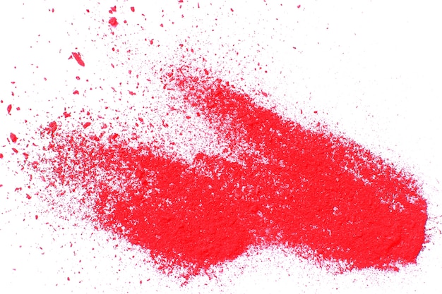 red powder explosion on white background.