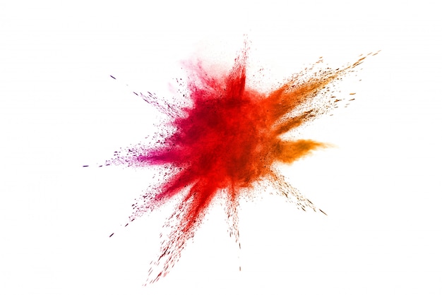 Red powder explosion on white background