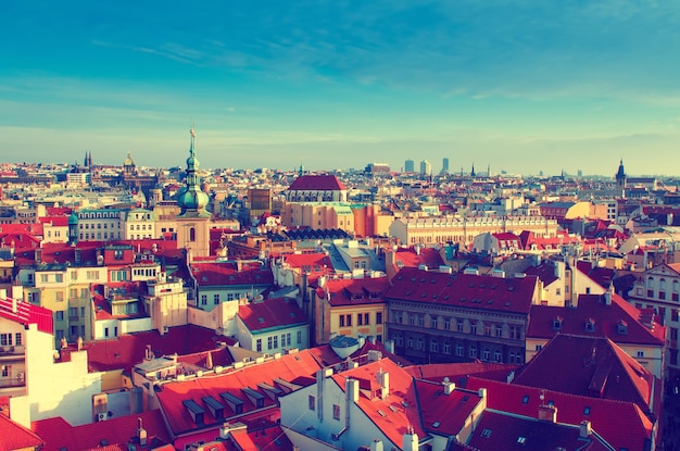 Red Prague roofs - view from the City Hall, travel european vintage hipster background